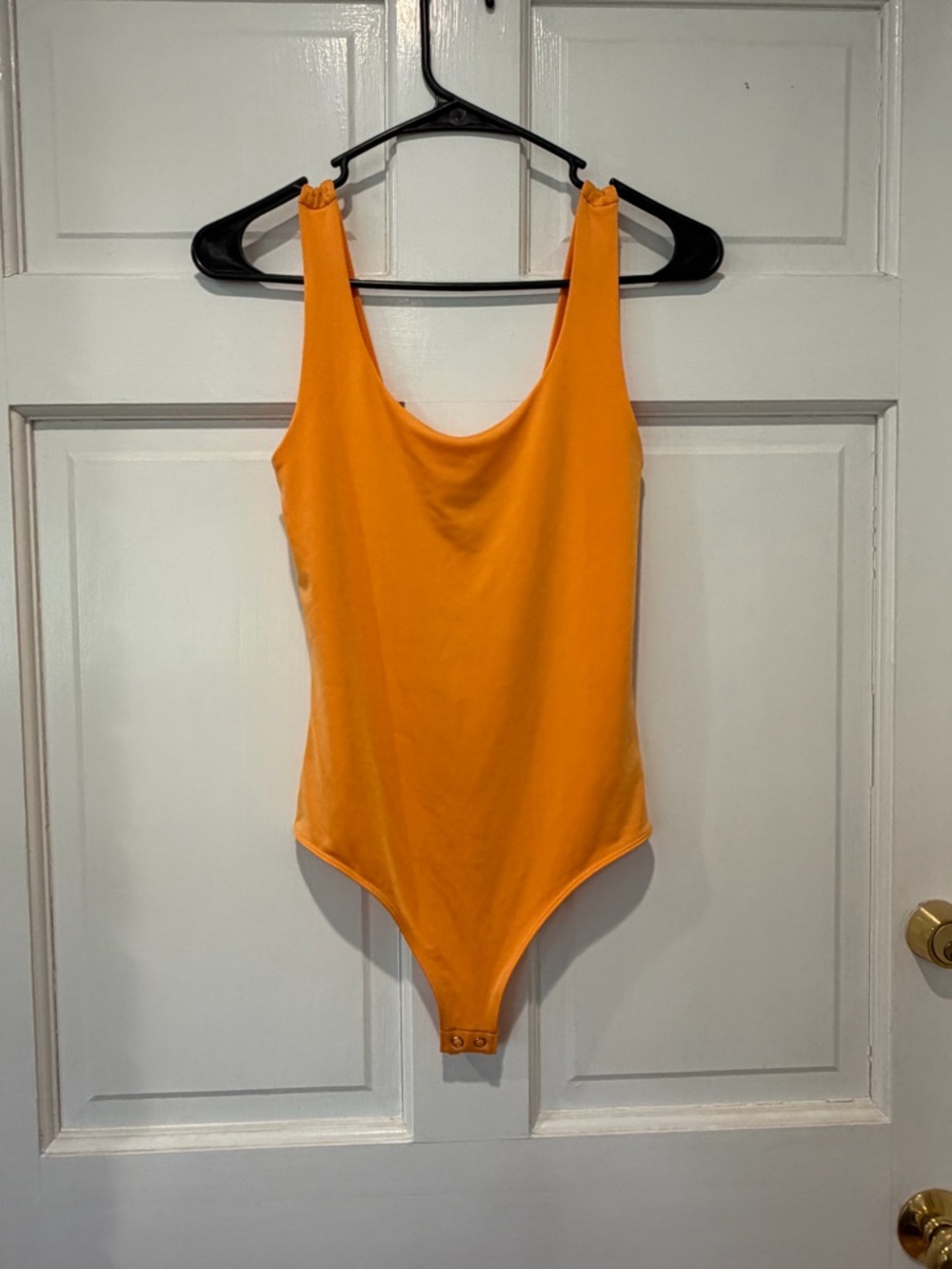 Orange One-Piece Bodysuit